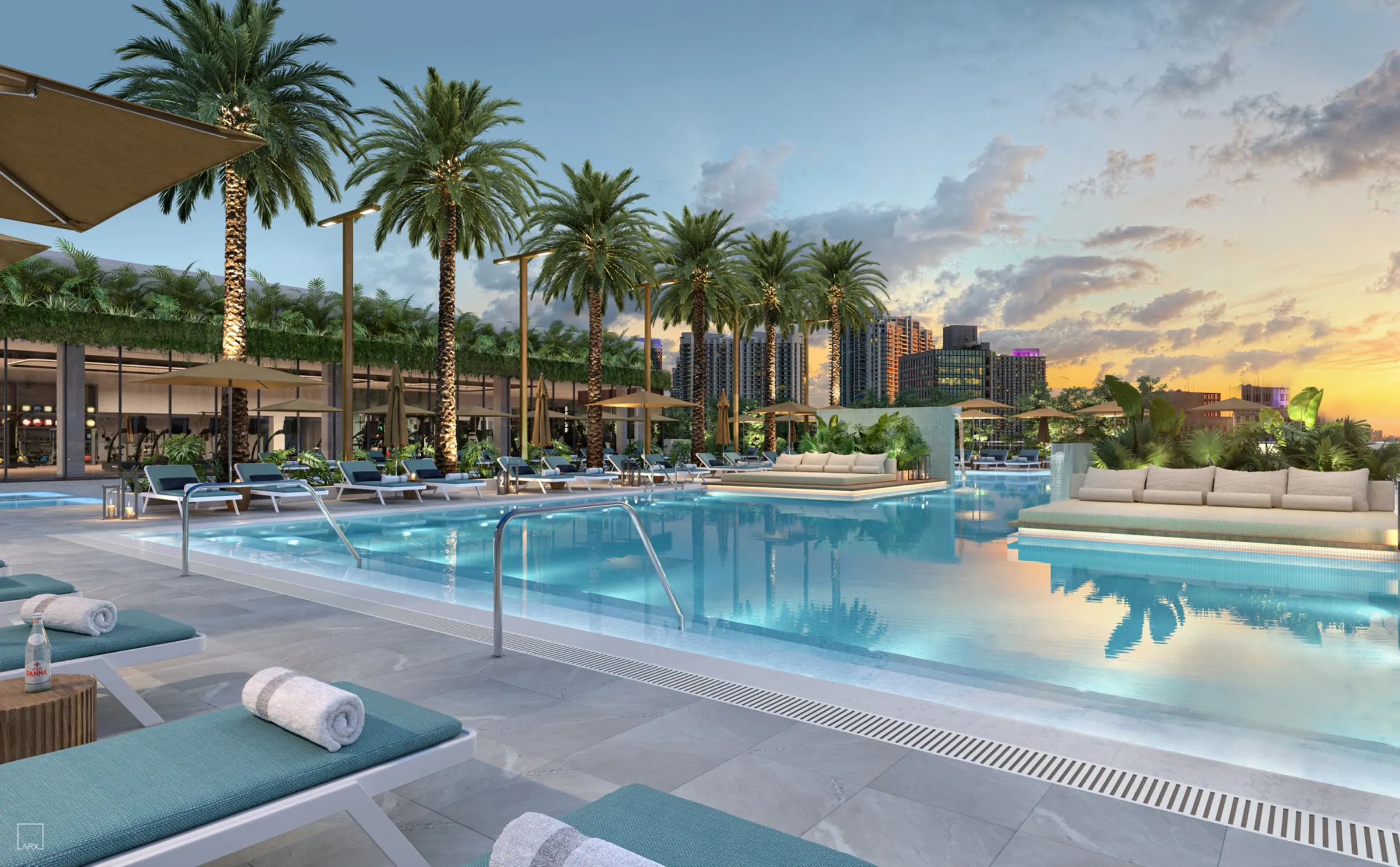 Piscina estilo resort con vistas panorámicas de la bahía al atardecer